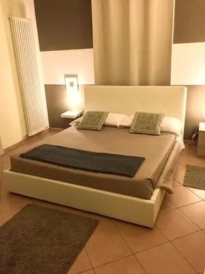 Letto o letti in una camera di RESIDENZA SERENA B&B - Centro Storico