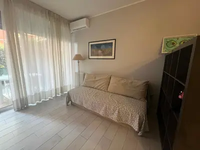 Letto o letti in una camera di Casa Lavagna giardinetto