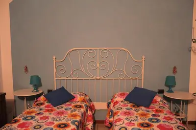 Letto o letti in una camera di Morgana