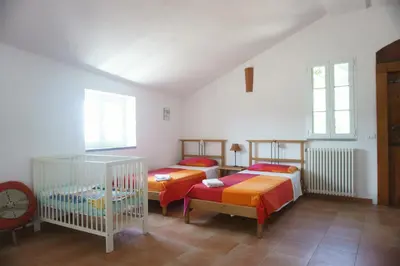 Letto o letti in una camera di Farmhouse B&B Castagnola 64
