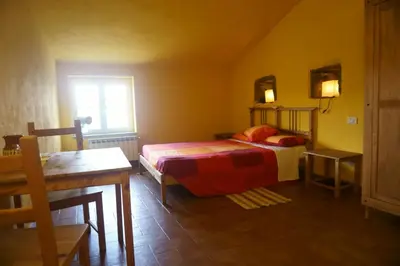 Letto o letti in una camera di Farmhouse B&B Castagnola 64