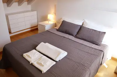 Letto o letti in una camera di Niki O. Apartments