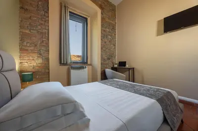Letto o letti in una camera di Dmora Retreat