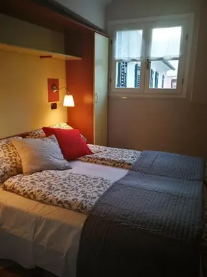 Letto o letti in una camera di Giada