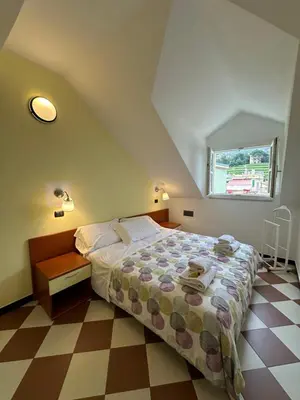 Letto o letti in una camera di Giada
