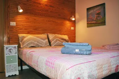 Letto o letti in una camera di Tigullio Vacations: lo Chalet sul Mare