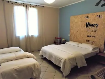 Letto o letti in una camera di B&B Casazze Dream