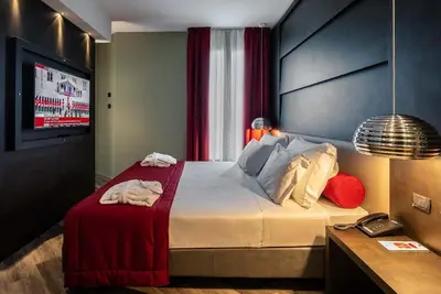 Letto o letti in una camera di Maranello Palace