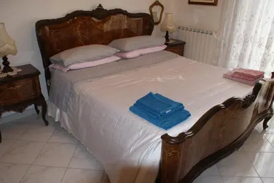 Letto o letti in una camera di Casa Nene