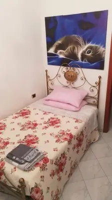 Letto o letti in una camera di Casa Nene
