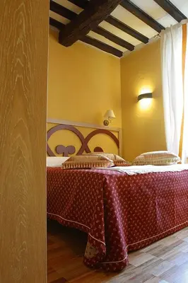 Letto o letti in una camera di Albergo Morandi