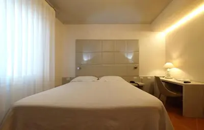 Letto o letti in una camera di Albergo Morandi