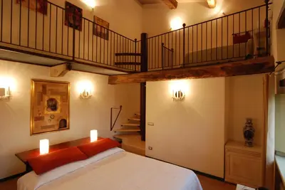Letto o letti in una camera di Locanda Del Re Guerriero