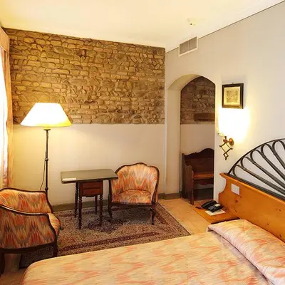 Letto o letti in una camera di Hotel Arnaldo Aquila D’oro