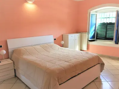 Letto o letti in una camera di Casetta sulla Baia del Silenzio