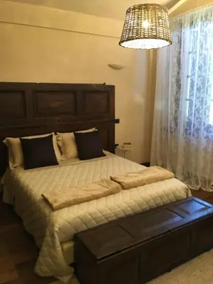 Letto o letti in una camera di Corte degli Angeli Agriturismo