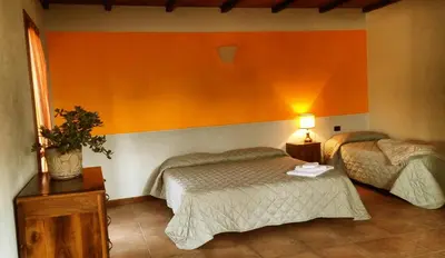 Letto o letti in una camera di Agriturismo di Sordiglio