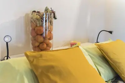 Letto o letti in una camera di B&B MI Casa Tu Casa