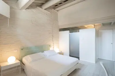 Letto o letti in una camera di Scaravelli Residenza