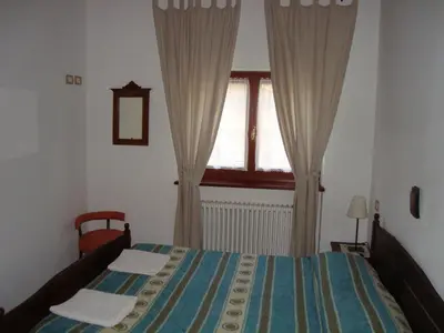 Letto o letti in una camera di Prati dei Campassi