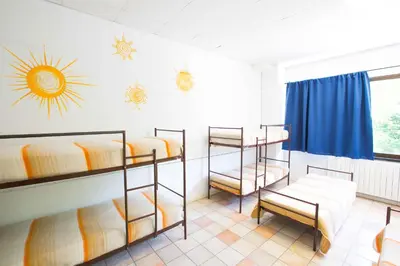 Letto o letti in una camera di Ostello Valtrebbia