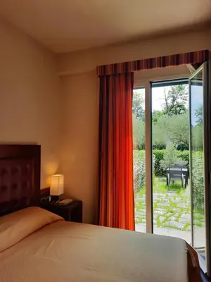 Letto o letti in una camera di Santa Caterina Park Hotel