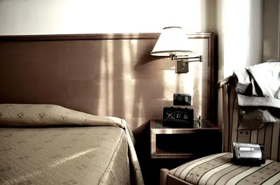 Letto o letti in una camera di Hotel Estense