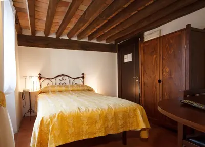 Letto o letti in una camera di Relais Fontevivo