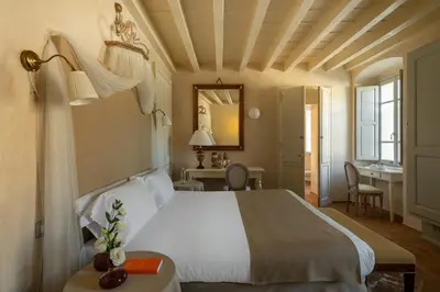 Letto o letti in una camera di Palazzo Novello
