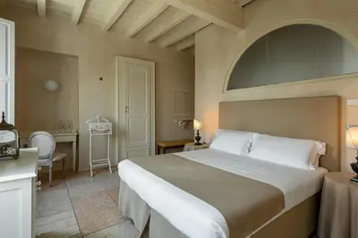 Letto o letti in una camera di Palazzo Novello