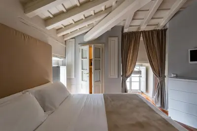 Letto o letti in una camera di Palazzo Novello