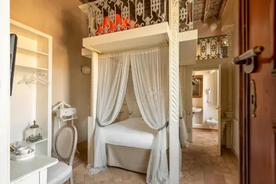 Letto o letti in una camera di Palazzo Novello