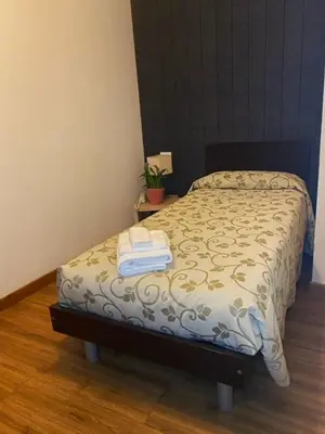Letto o letti in una camera di Locanda L'Ombrosa