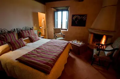 Letto o letti in una camera di Antica Corte Pallavicina Relais