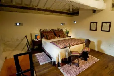 Letto o letti in una camera di Antica Corte Pallavicina Relais