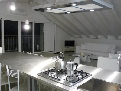 Area soggiorno di Penthouse by the Sea
