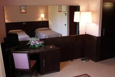 Letto o letti in una camera di Hotel City