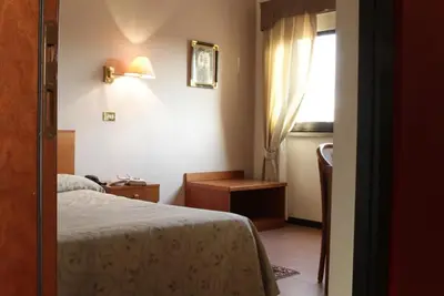 Letto o letti in una camera di Hotel City