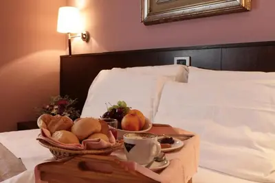 Letto o letti in una camera di Hotel City