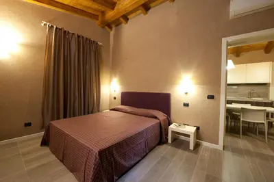Letto o letti in una camera di Hotel Locanda Stendhal