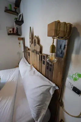 Letto o letti in una camera di La Pomposa del Teatro