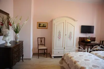Letto o letti in una camera di B&B Paola e Francesco