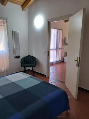Letto o letti in una camera di Casa Cinzia Bonassola Cinque Terre