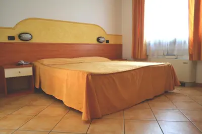 Letto o letti in una camera di Hotel Fontana