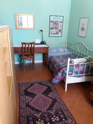 Letto o letti in una camera di B&B 