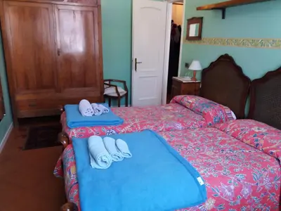 Letto o letti in una camera di B&B 