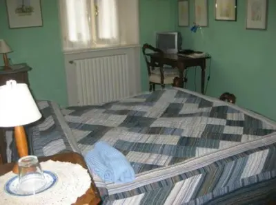Letto o letti in una camera di B&B 