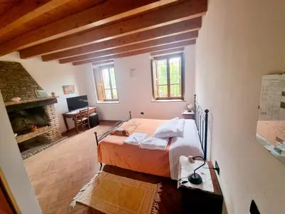 Letto o letti in una camera di La Garzaga Turismo Rurale