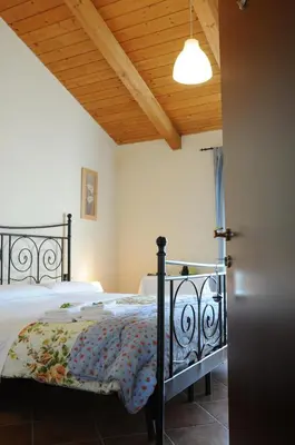 Letto o letti in una camera di Agriturismo La Fattoria Del Boschetto