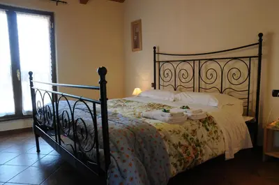 Letto o letti in una camera di Agriturismo La Fattoria Del Boschetto